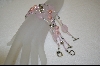 +  Set of 4 Pink Glass Bead Bracelets
