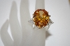 +MBA #19-547  Large Oval Cut Champagne CZ Ring
