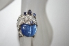 +MBA #21-578  Sterling Blue Fiber Optic Hand Carved Face & Iolite Ring