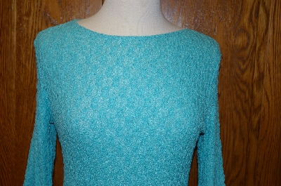 +MBA #25-141   "From Creative Design Works Turquoise Colored Stretch Top