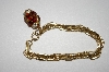 +MBA #25-738  Vintage Gold Tone Red & Clear Rhinestone Bracelet