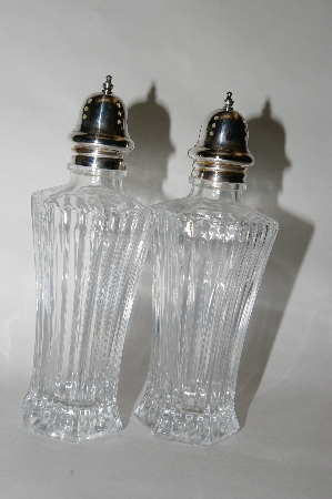 +MBA #65-068   "Pair Of "Symmetry" Clear Glass Salt & Pepper Shakers With Sterling Tops
