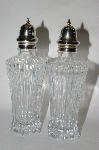 +MBA #65-068   "Pair Of "Symmetry" Clear Glass Salt & Pepper Shakers With Sterling Tops