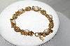 +MBA #87-177  Vintage "Florenza" Goldtone Faux Pearl Bracelet