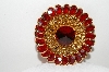 +MBA #99-393  "Vintage Goldtone Red Crystal Fancy Brooch"