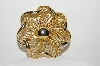 +MBA #E42-093  "Lisner Goldtone Fancy Flower Brooch"