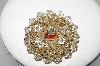 +MBA #E42-077  "Vintage Goldtone Round AB Crystal Brooch"