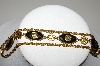 +MBA #E42-062  "Coro Goldtone 3 Strand Coin & Black Stone Bracelet"