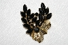 **MBA #E49-196   "Vintage Gold Tone Fancy Black Glass Stone Leaf Brooch"