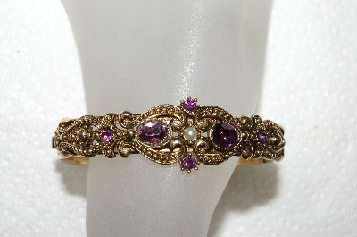 +MBA #E52-206   "Avon Antiqued Goldtone Purple Rhinestone Hinged Cuff Bracelet"