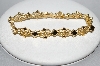 +MBA #E51-385   "Avon Gold Tone Fancy Link Bracelet"