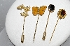 **MBA #E54-015    "Vintage Lot Of "4" Gold Plated Stick Pins"