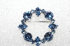 +MBA #E56-250   "Kramer Silvertone Blue Crystal Rhinestone Pin"