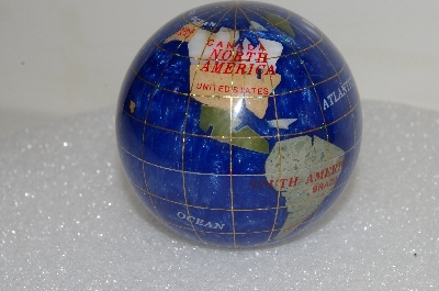 +MBA #S25-339   "Gemstone Paper Weight Globe"