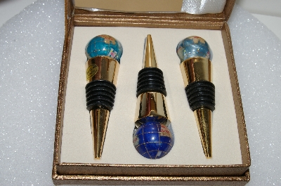 +MBA #S25-337   "Set Of 3 Blue Gemstone Globe Wine Stoppers"