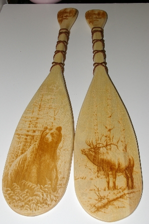 +MBA #S25-013   "Set Of 2 Artist Signed Wood Burned Wildlife Canoe Paddles"