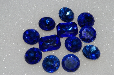 +MBA #S25-220   "Vintage Lot Of 12 Blue Faceted Large Glass Rhinestones"