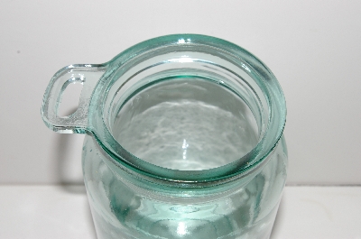 +MBA #S30-149   "1980's Large Green Glass Canister With Cork Top & Wooden Spoon"