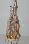 +MBA #S13-146  "2003  White Metal & Pink Bottle Votive Candle Holder"