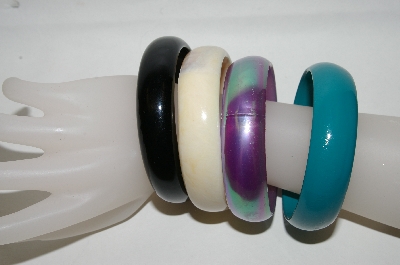 +MBA #88-008  "Set Of 4 Acrylic Bangle Bracelets"