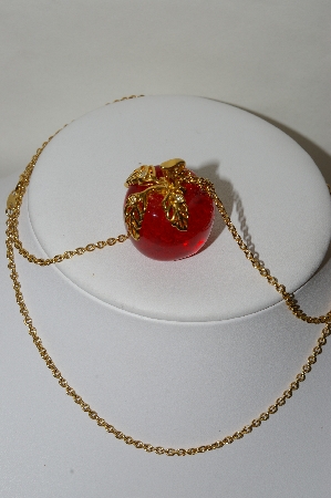 +MBA #88-092  "Vintage Avon Red Lucite Apple Pendant With 32" Chain"
