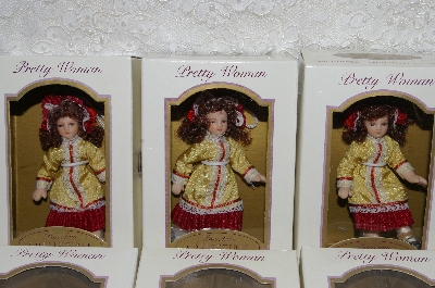 +MBA #SG9-032  "2004 Set Of 6 Gold & Red Collectible Porcelain Doll Ornaments"