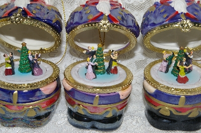 +MBA #SG9-102    "Mr. Christmas Set Of 3 Porcelain Nutcracker Animated Music Box Ornaments"